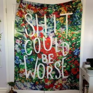 Bright floral tapestry. “Shit could be worse”
